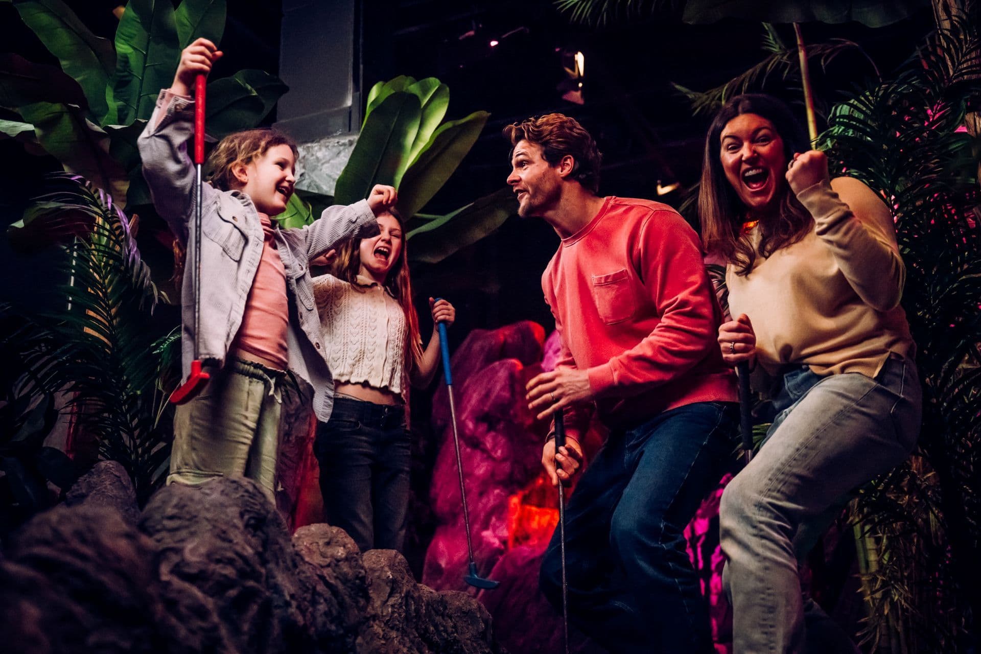 A family celebrating at Treetop