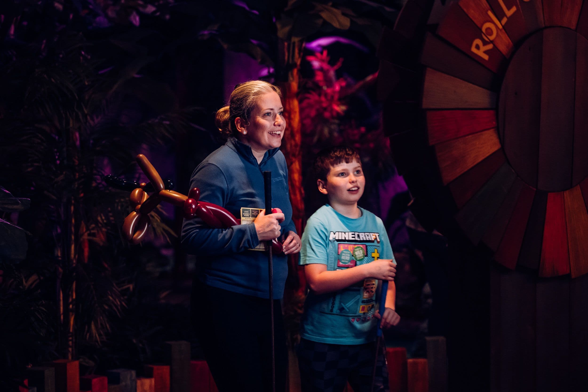 A mum and child at Treetop Golf